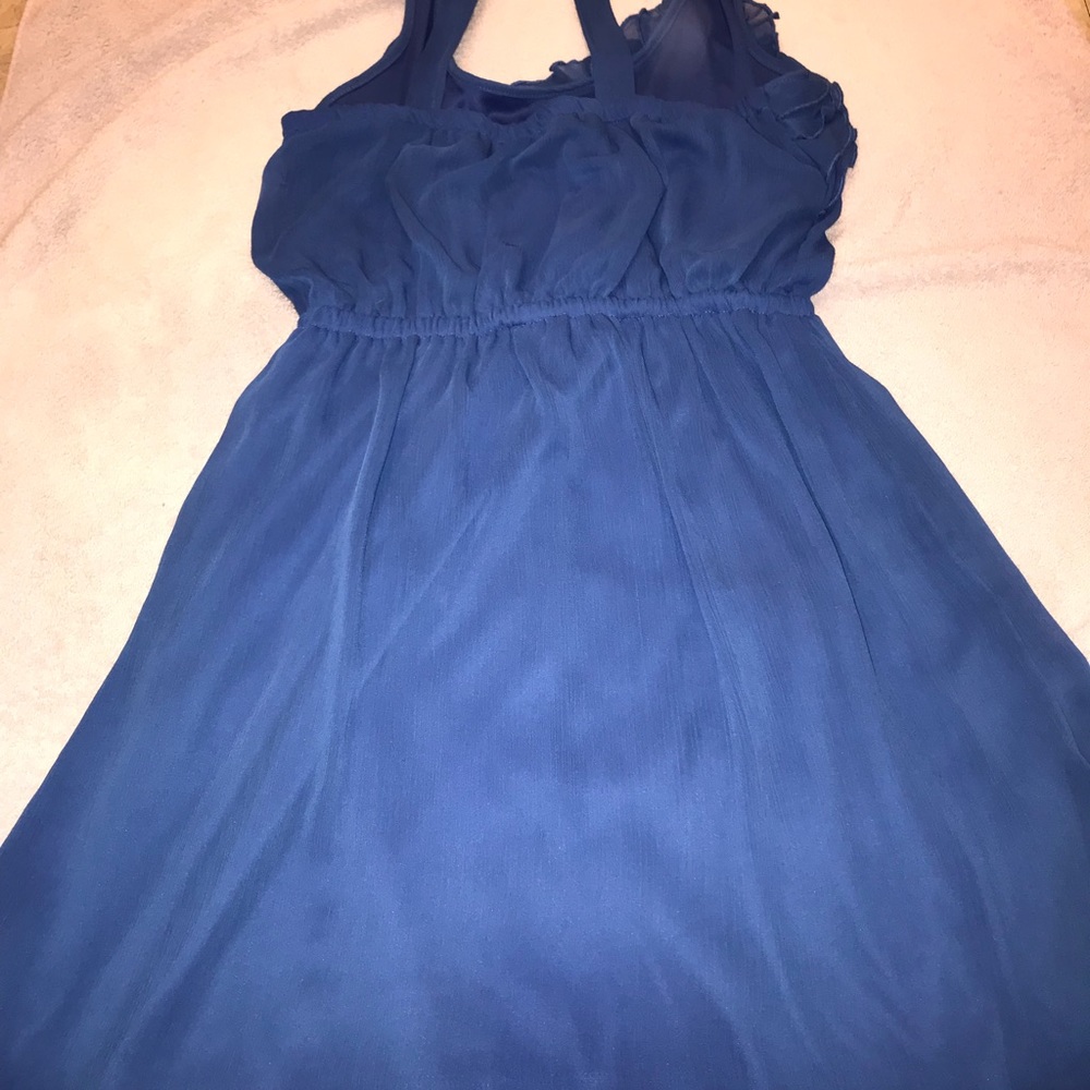 Blue dress with ruffles one side top